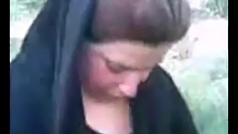 Hijab-Wearing Arab Woman Indulges In Outdoor Sex